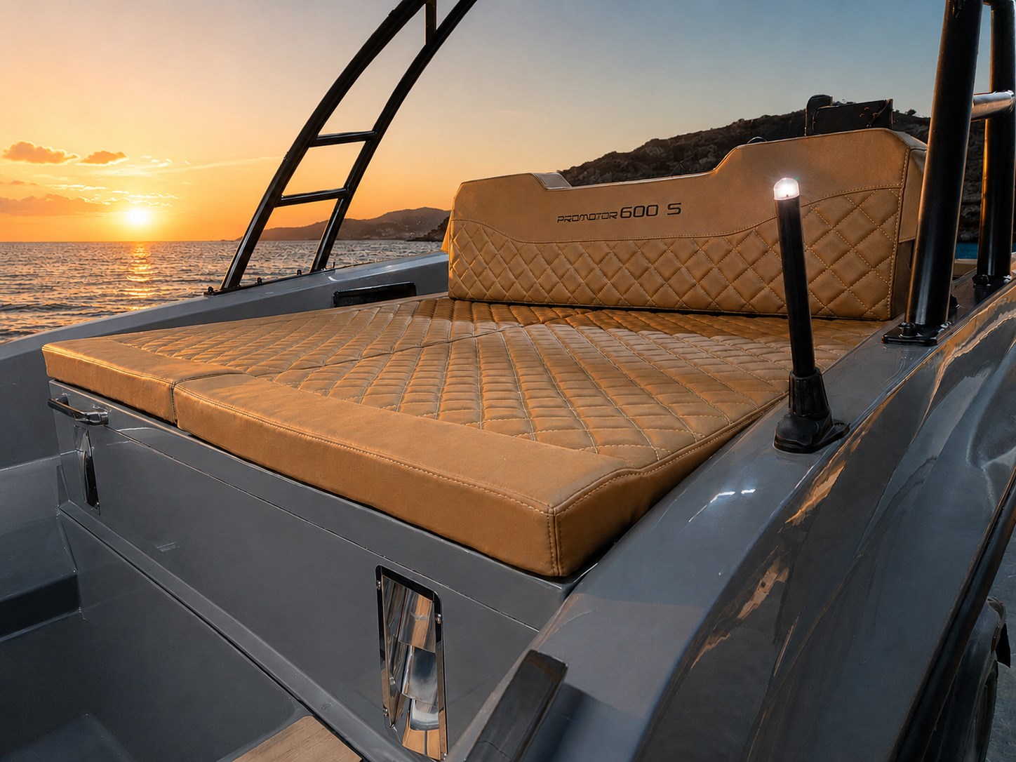 Large aft sunbed aboard the Promotor 600 Double Sundeck at sunset